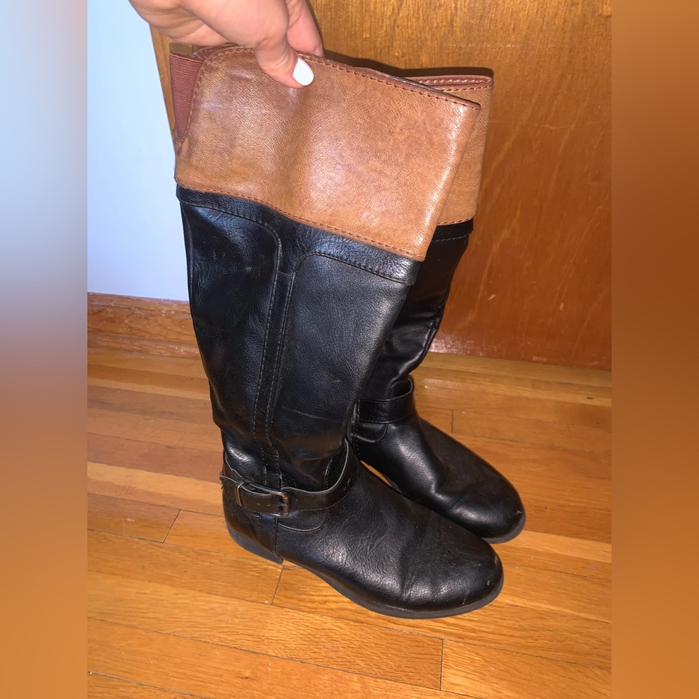 Brown and tan boots